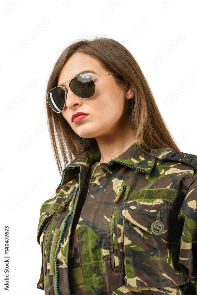 portrait of a beautiful woman soldier with camouflage uniform and sunglasses portrait of a beautiful woman soldier with camouflage uniform and sunglasses