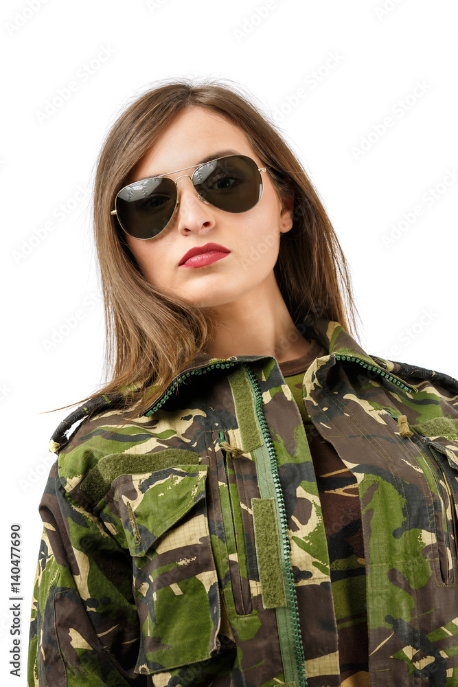 portrait of a beautiful woman soldier with camouflage uniform and sunglasses portrait of a beautiful woman soldier with camouflage uniform and sunglasses