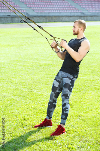 Man pulling training loop to himself