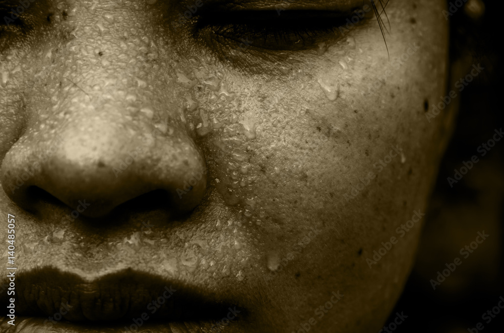 Fototapeta premium Black and white. Closeup sweat on face of woman asian