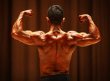Male body builder back muscles