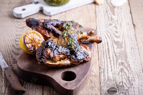 Homemade barbecued chicken with pesto sauce