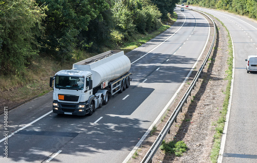 White cistern in motion on the motorway