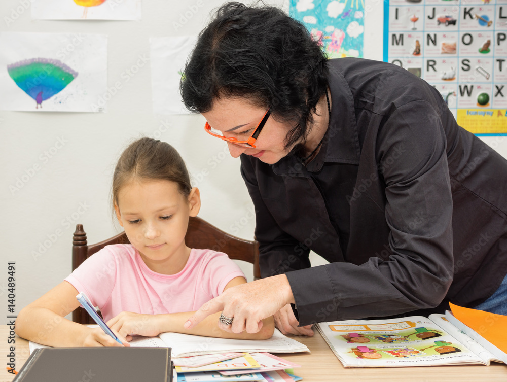 English language teacher help little girl with home work English language teacher help little girl with home work