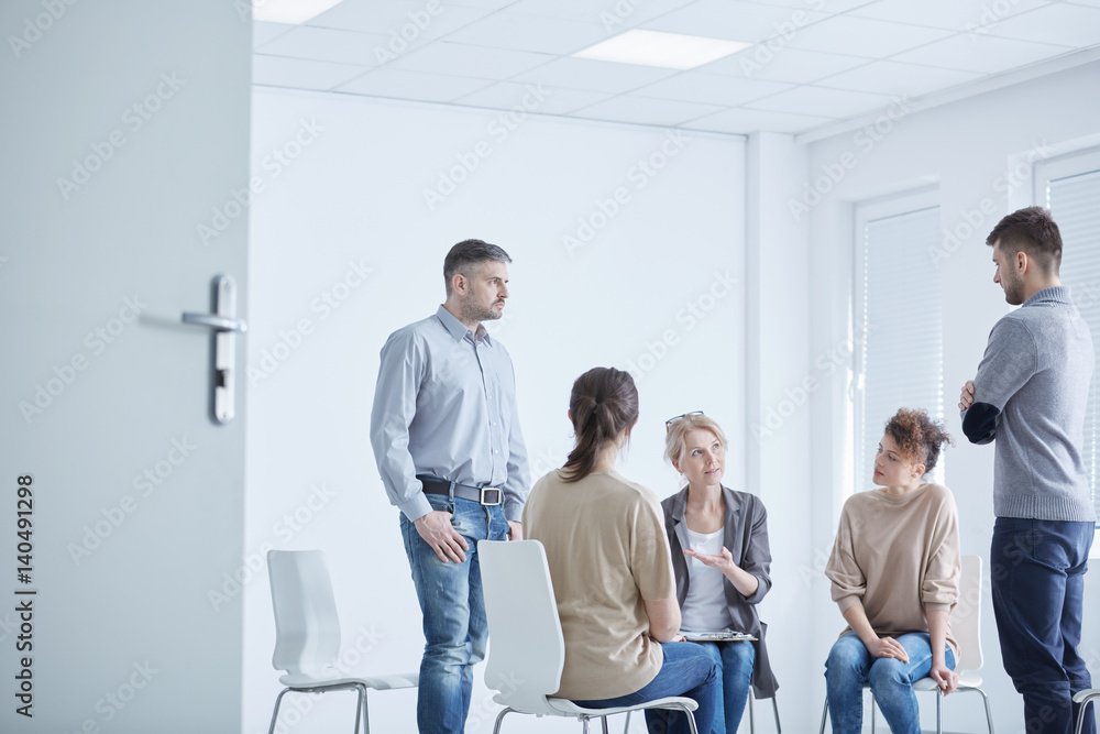 Fototapeta premium Men participating in psychodrama