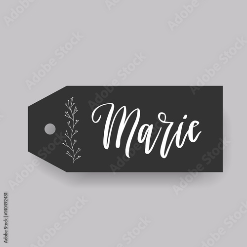 Common female first name Doris on a tag. Hand drawn calligraphy. Wedding typography element.