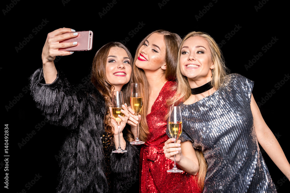 Stylish women taking selfie