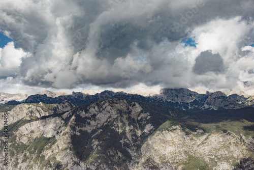 Weather concept. Stormy cloud over high mountain range. Julian Alps, Slovenia. 