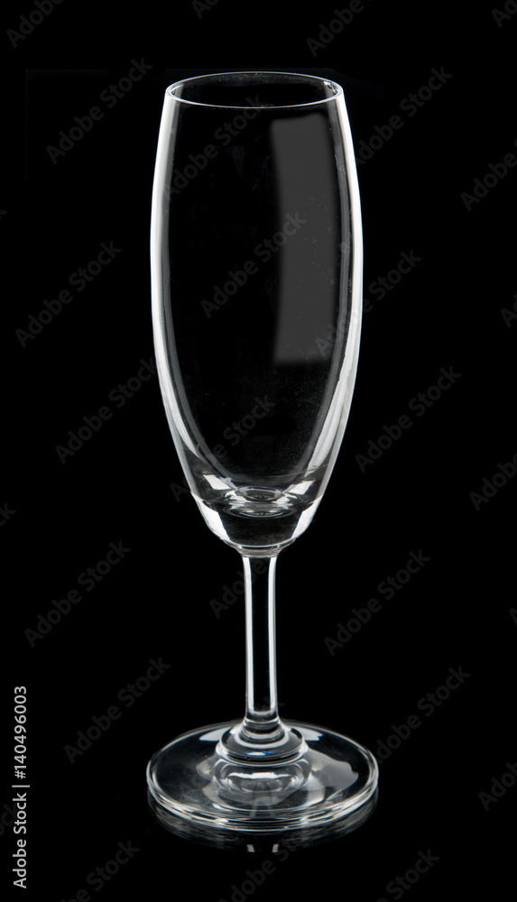 Empty wine glass isolated on a black background Empty wine glass isolated on a black background