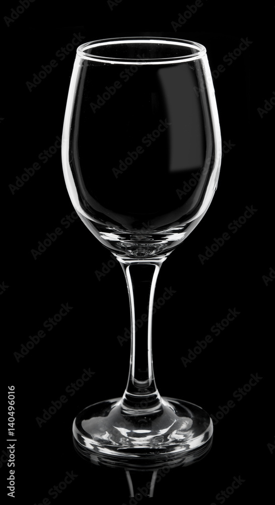 Empty wine glass isolated on a black background