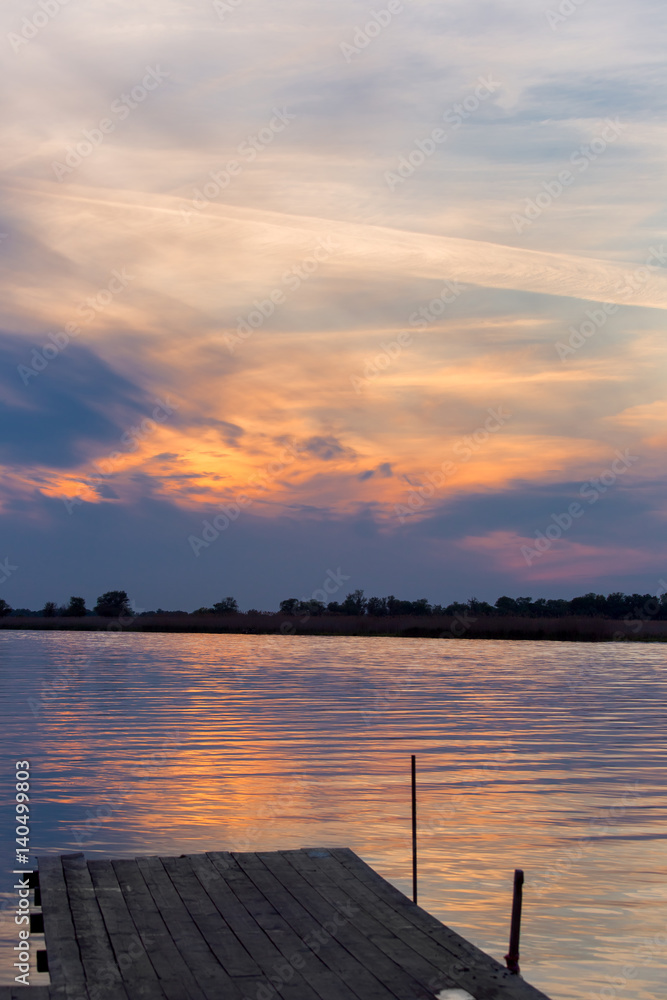 The sunset on the small river.