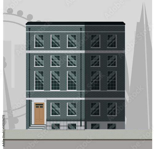 British traditional apartment building with stairs in the main door.