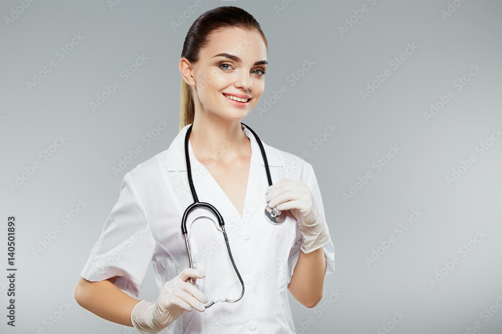 Female doctor in white medical robe Female doctor in white medical robe