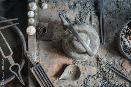 Photography At silversmith's workshop with traditional tools