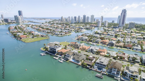 Aerial view with Macintosh island waterfront properties to the right, and surrounds.facing north with Surfers Paradise in the horizon. © Bostock