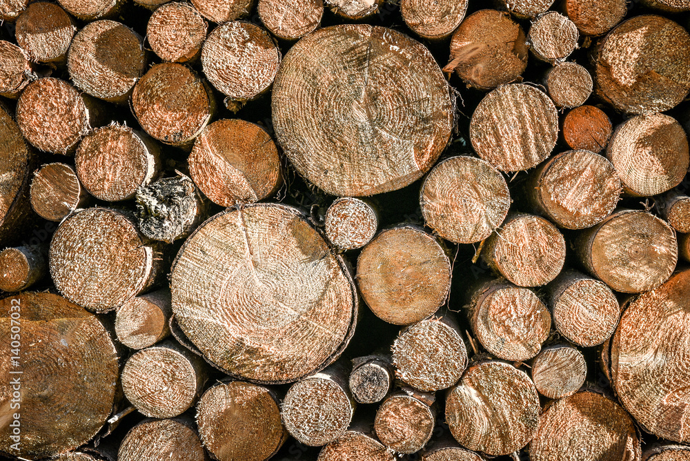 Pile or stack of natural fire wood logs texture background. Pile or stack of natural fire wood logs texture background.