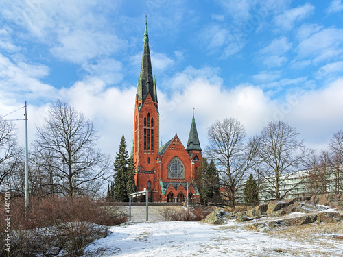 St. Michael's Church in Turku in winter, Finland. It's named after Archangel Michael and was finished in 1905 by design of the Finnish architect Lars Sonck in the neogothic style. photo