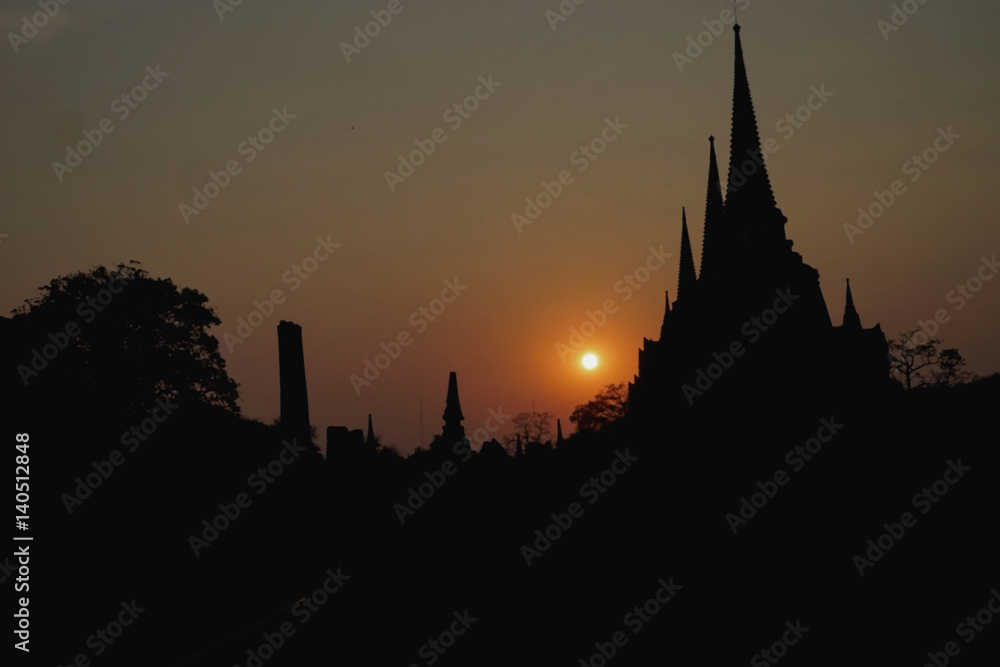 The image of the old pagoda silhouette is a very pleasant image.
