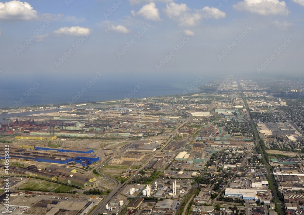 aerial view across the city of Hamilton along Lake Ontario, Ontario Canada aerial view across the city of Hamilton along Lake Ontario, Ontario Canada