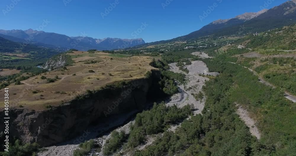 Aerial inspirational drone view cliff and river alps Aerial inspirational drone view cliff and river alps