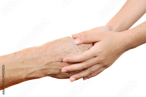 child holding senior old woman by the hands isolated in the white background. Two generation make a care each other.