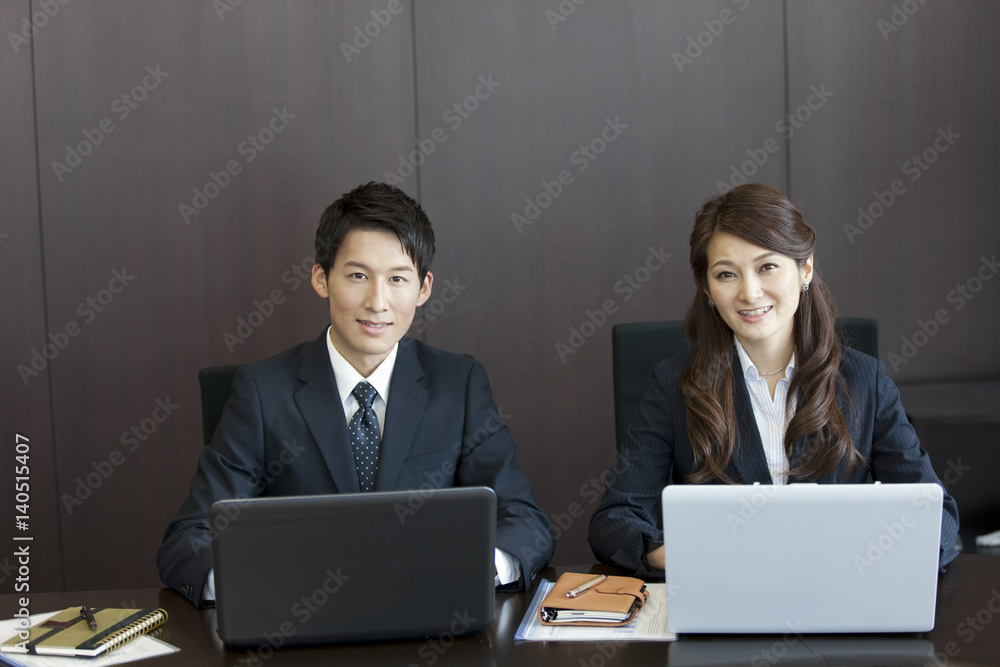 Two businessmen smiling Two businessmen smiling