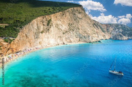 Porto Katsiki beach in Lefkada island, Greece. Luxury yacht on a blue sea.