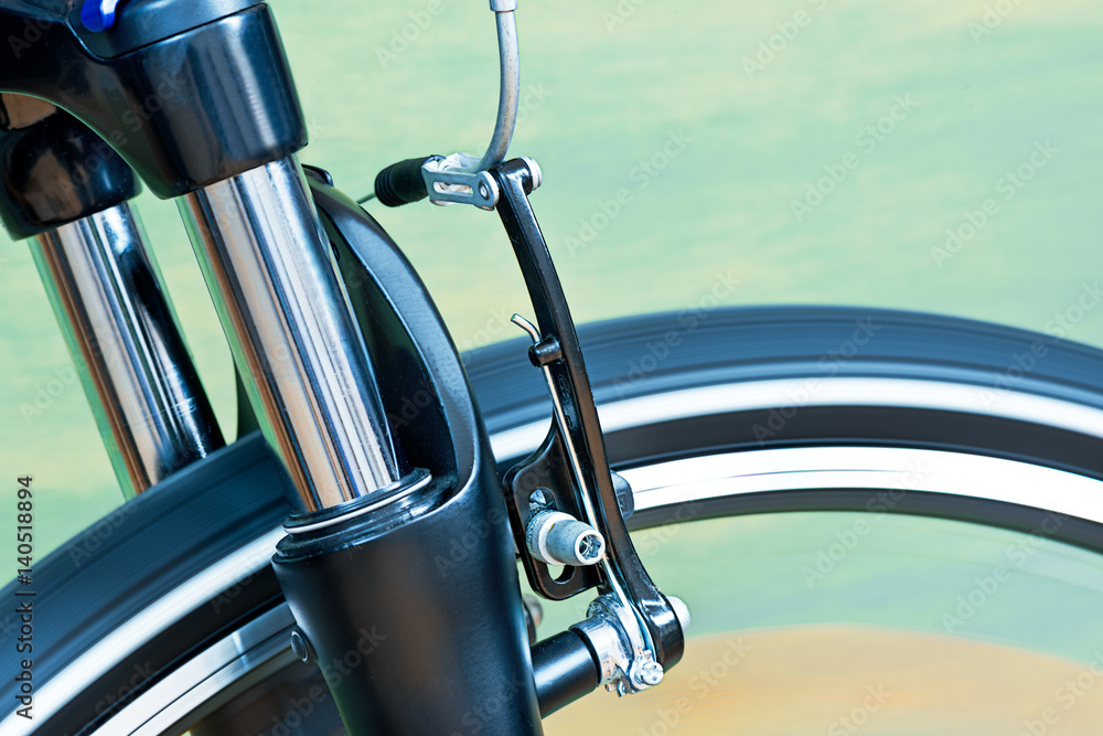 Obraz premium Detail Of Caliper Brakes And Suspension Fork