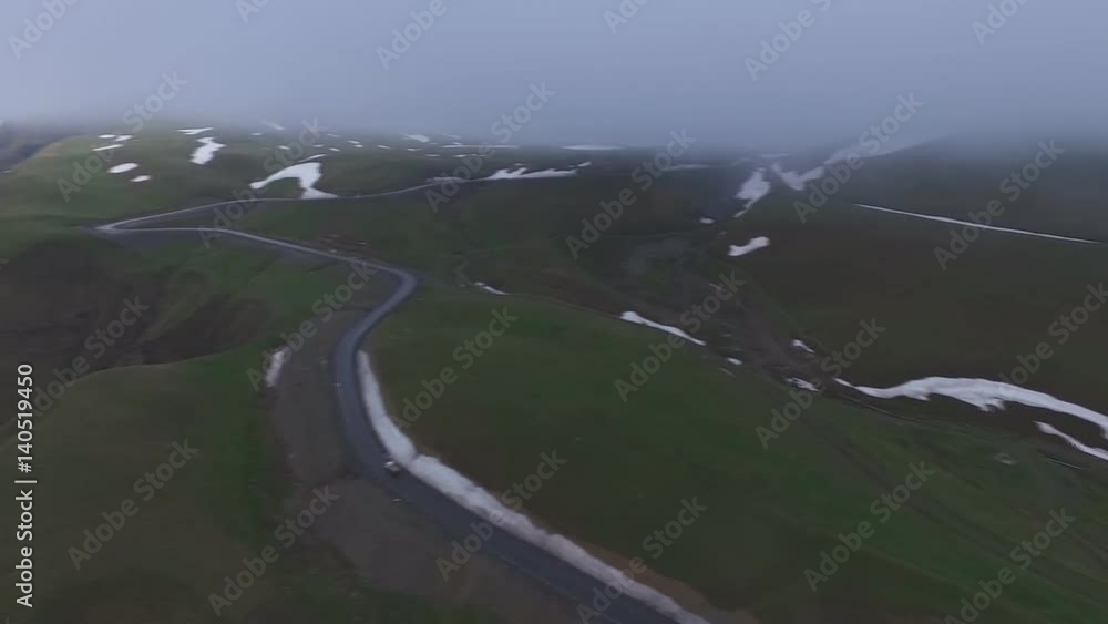 Aerial video from the quadrocopter, mountain road and gorge, Kazbegi, Georgia Aerial video from the quadrocopter, mountain road and gorge, Kazbegi, Georgia