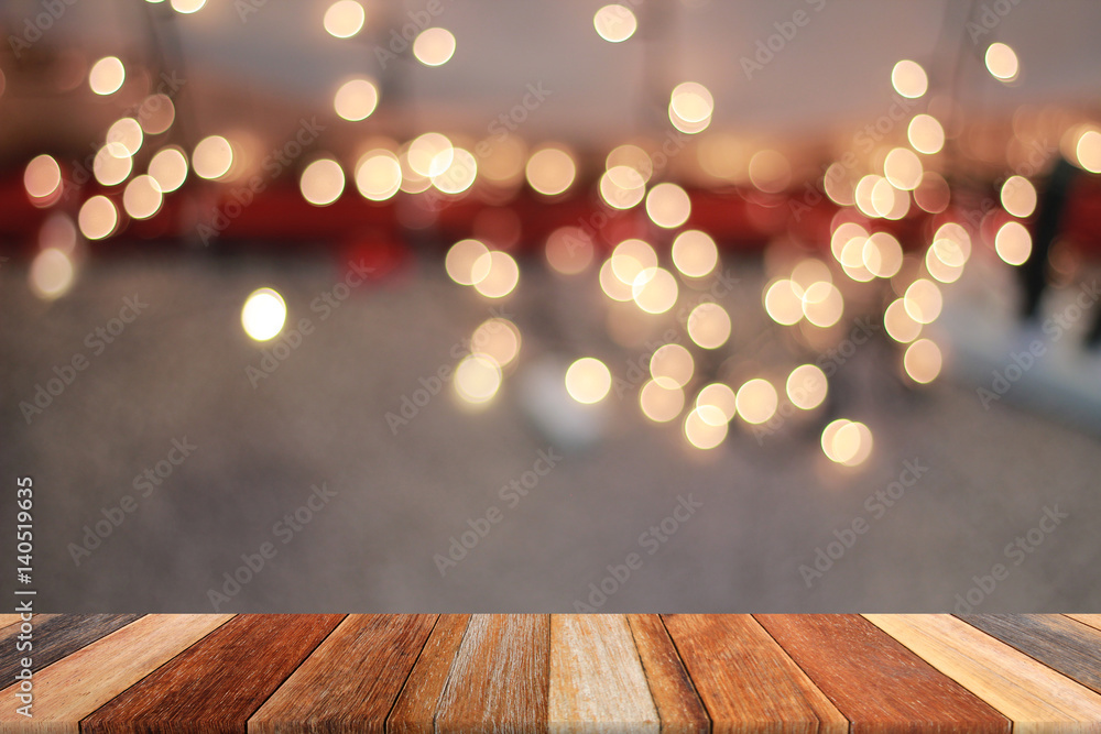 Warm bokeh blurred background on wood of brown Warm bokeh blurred background on wood of brown