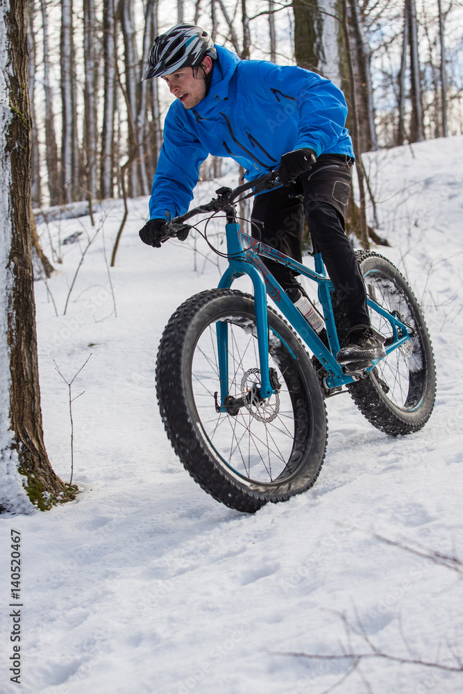 Fat biker riding in the snow Fat biker riding in the snow