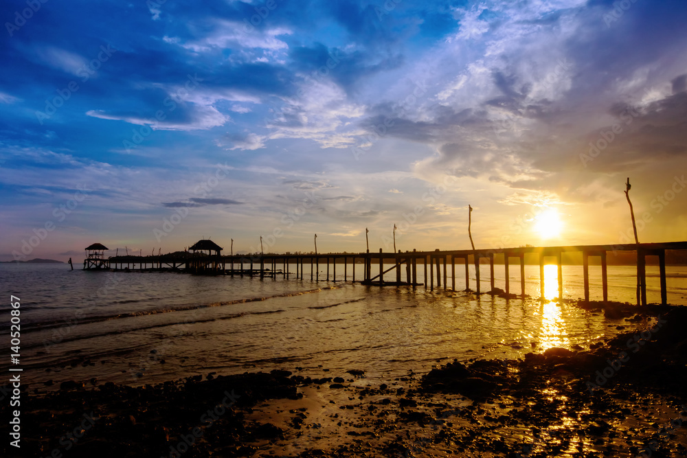 Wooded bridge to the sea between sunset at Koh Kood, Trat, Thailand