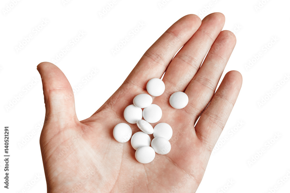 Palm with drugs and pills isolated on white Palm with drugs and pills isolated on white