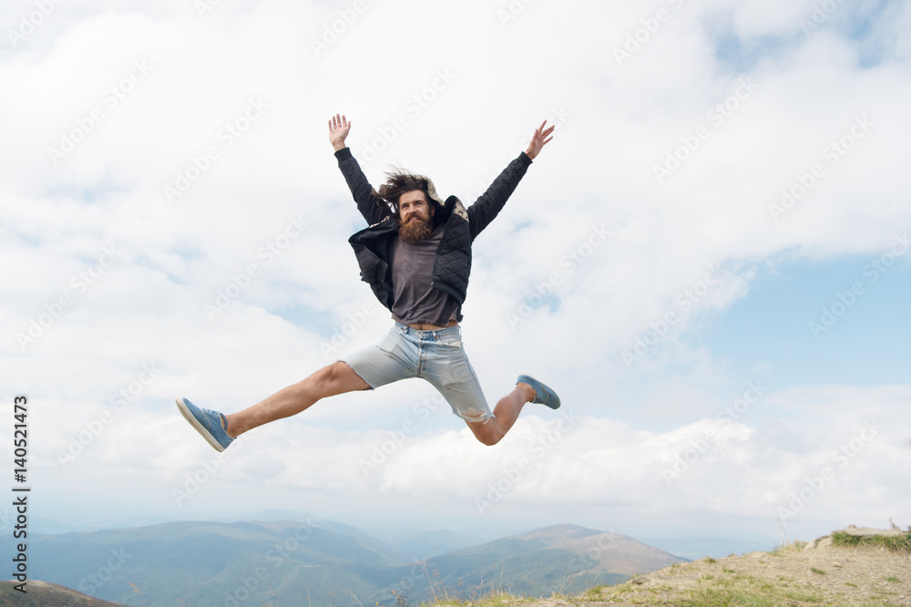 bearded man, brutal caucasian hipster with moustache jump on mountain bearded man, brutal caucasian hipster with moustache jump on mountain