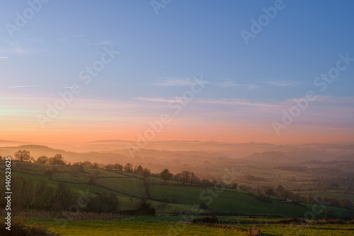 Calm golden sunset over the rural landscape