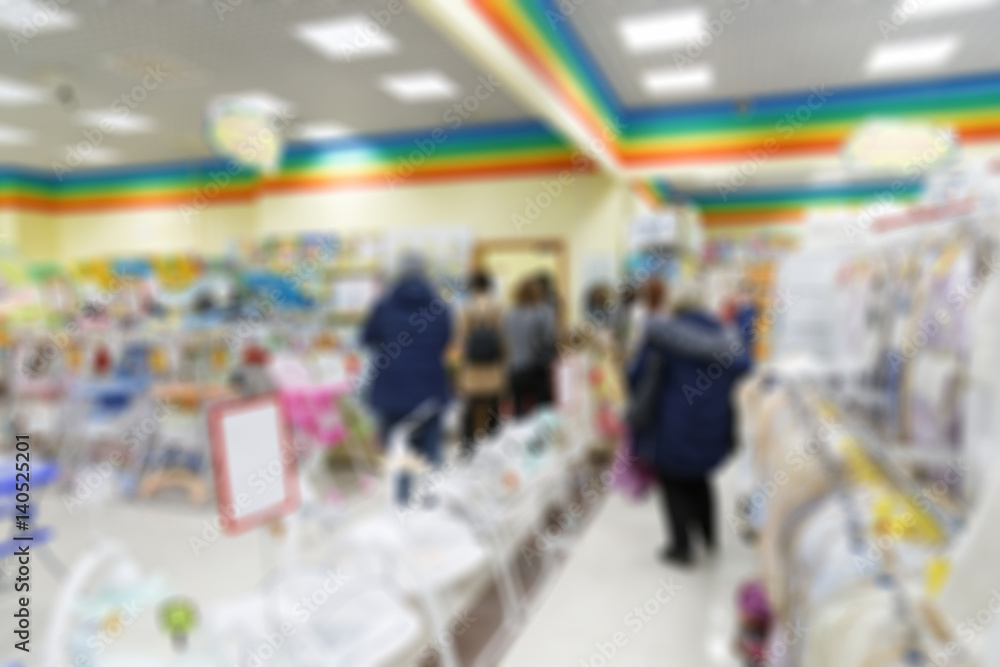 Blurred background image of supermarket or shopping mall.