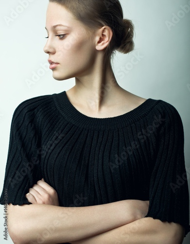 Fashion portrait of beautiful blonde model with nude makeup.