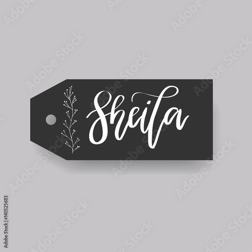 Common female first name Sheila on a tag. Hand drawn calligraphy photo