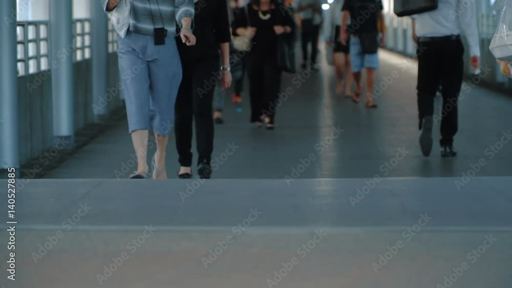 People pedestrians walk big city junction slow motion. Low angle shot. Full HD slow motion stock footage.
People pedestrians walk big city junction slow motion. Low angle shot. Full HD slow motion stock footage.