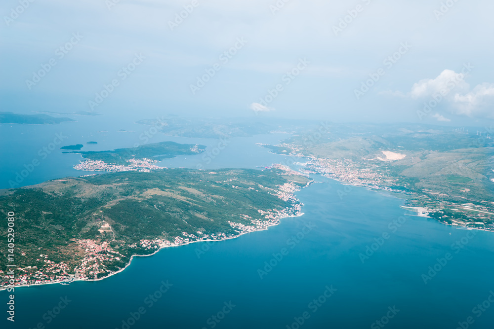 View on Adriatic from plane. Traveling, holiday, vacation concept.