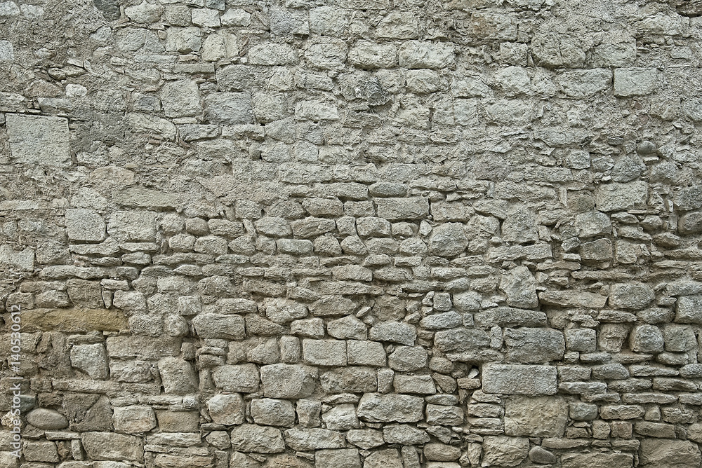 Old grey stone wall texture background Old grey stone wall texture background