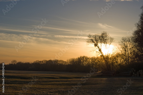 Fototapeta Naklejka Na Ścianę i Meble -  Sunset on field in Munchhausen