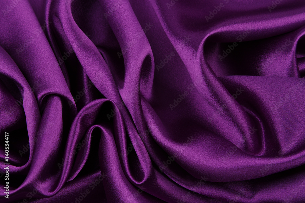 Obraz premium Rippled purple silk sheet fabric texture