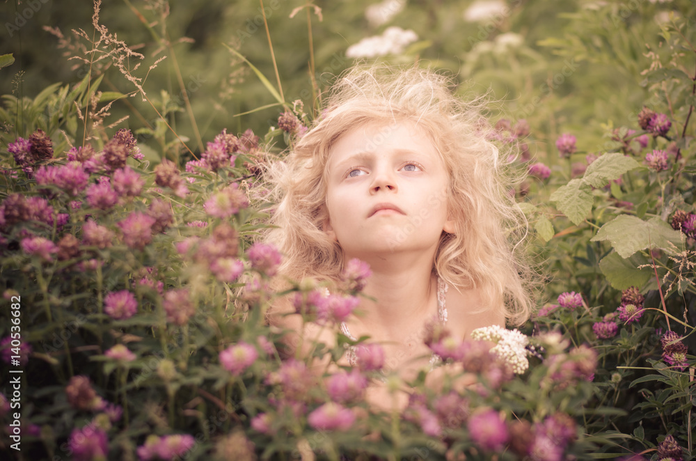 Fototapeta premium child and flowers