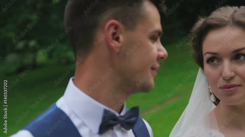 The bride and groom look at each other The bride and groom look at each other