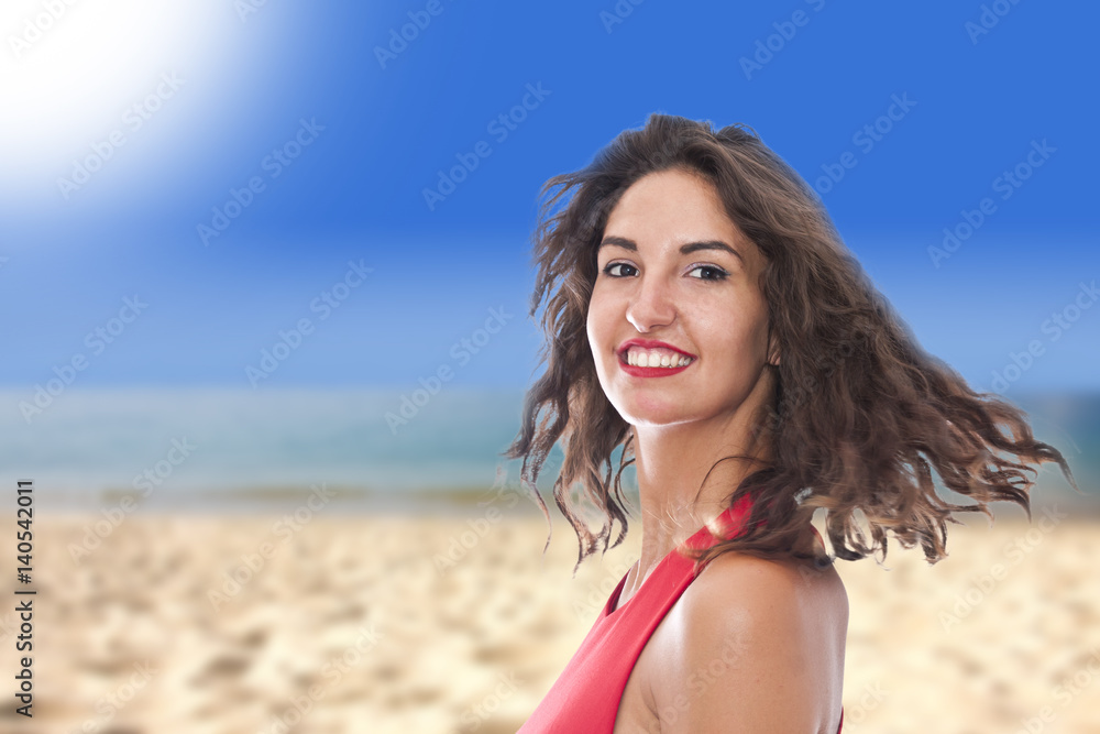 portrait of smiling young woman on the beach portrait of smiling young woman on the beach