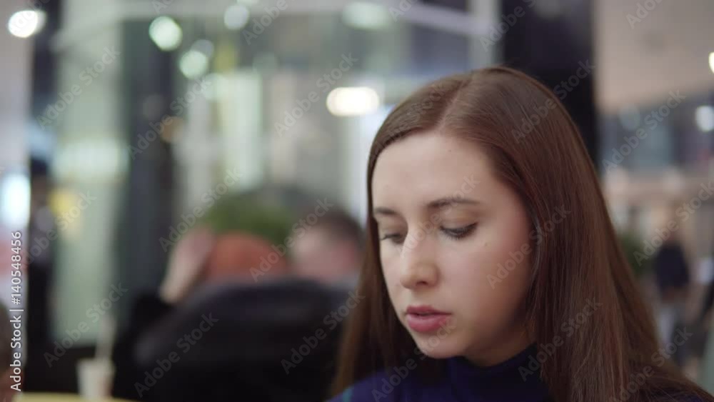 custom made wallpaper toronto digitalAttractive young woman eating a french fries in a mall