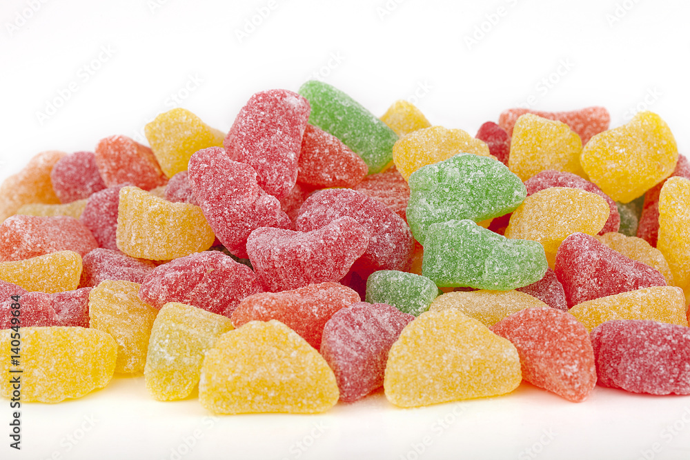 Colorful jelly candies fruit slices isolated on white Colorful jelly candies fruit slices isolated on white