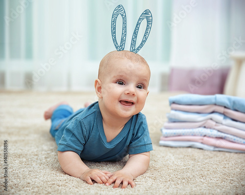 Smiling adorable baby with ...