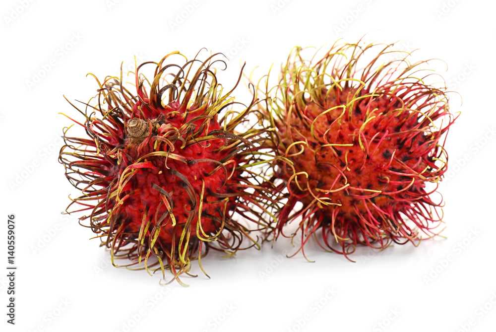 Naklejka premium Juicy rambutans isolated on white